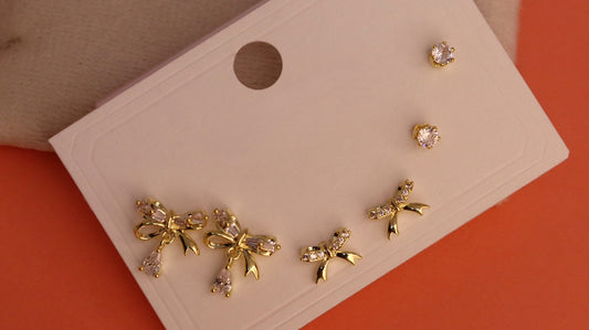 Golden Bow Spark Studs